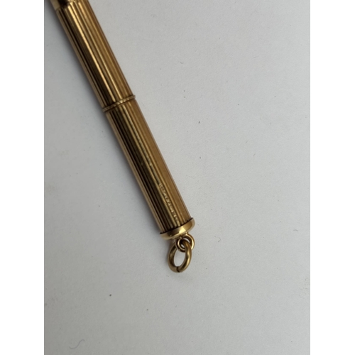 575 - A HALLMARKED 9CT GOLD PROPELLING TOOTHPICK, WEIGHT 5.8 GRAMS