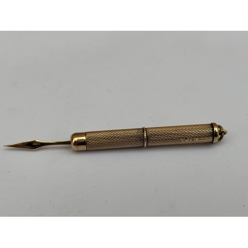 577 - A HALLMARKED 9CT GOLD PROPELLING TOOTHPICK, WEIGHT 5.5 GRAMS