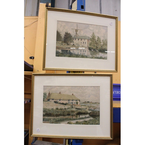 903 - TWO FRAMED WATERCOLOURS OF COTTAGES BY THE RIVER SIGNED E C WADLOW, ONE 1947, THE OTHER 1953