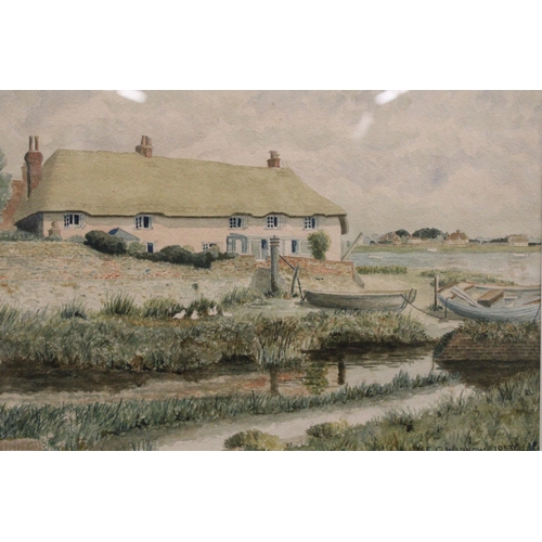 903 - TWO FRAMED WATERCOLOURS OF COTTAGES BY THE RIVER SIGNED E C WADLOW, ONE 1947, THE OTHER 1953