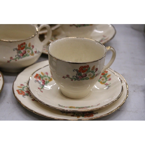 967 - A VINTAGE ALFRED MEAKIN TEASET TO INCLUDE BOWLS, CUPS, SAUCERS, SIDE PLATES AND A CREAM JUG