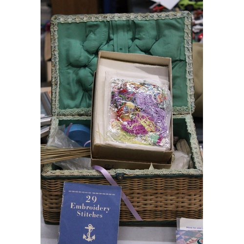 968 - A VINTAGE SEWING BASKET CONTAINING TAPESTRY THREADS, ETC PLUS A QUANTITY OF KNITTING, LACE BOOKS, ET... 