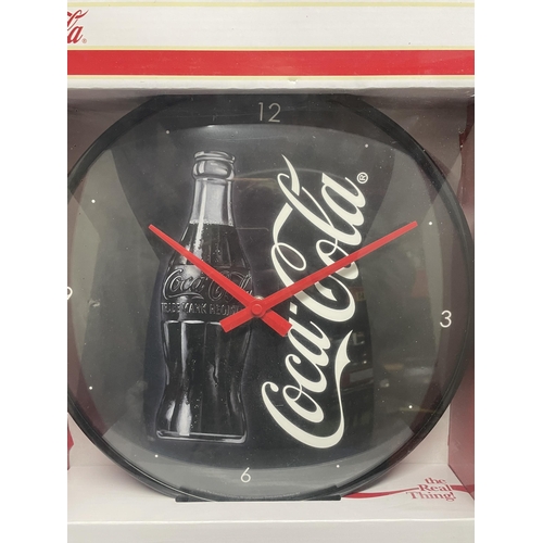 21 - A NEW AND BOXED COCA COLA CLOCK