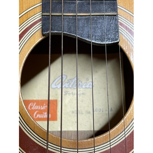 37 - AN ACCOUSTIC GUITAR