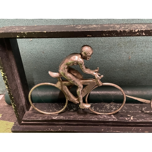 39 - A FRAMED RETRO CYCLIST