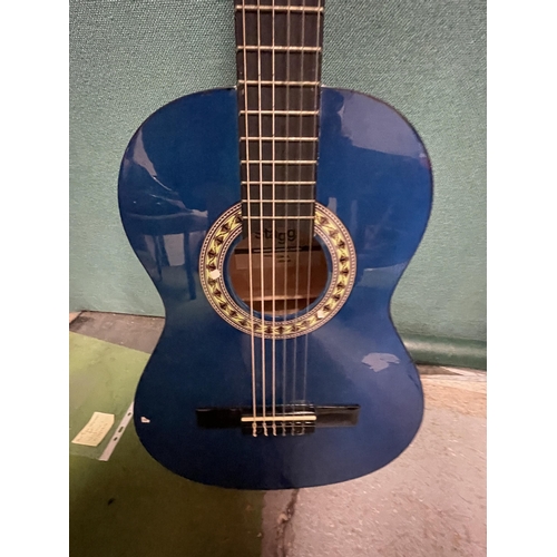 45 - AN ACCOUTIC GUITAR