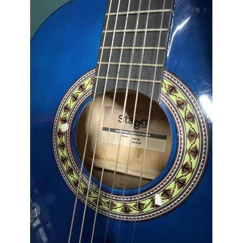 45 - AN ACCOUTIC GUITAR