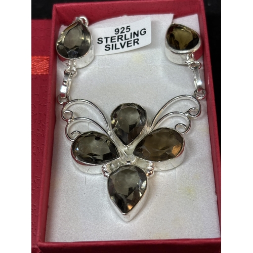 57 - A MARKED 925 SILVER SMOKEY QUARTZ NECKLACE IN A PRESENTATION BOX