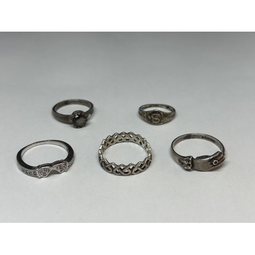 65 - FIVE VARIOUS SILVER RINGS