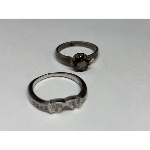 65 - FIVE VARIOUS SILVER RINGS