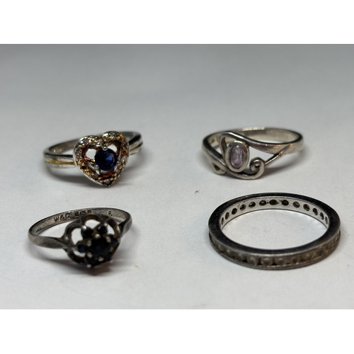 68 - FOUR VARIOUS SILVER RINGS