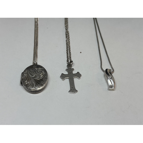 75 - THREE SILVER NECKLACES WITH PENDANTS