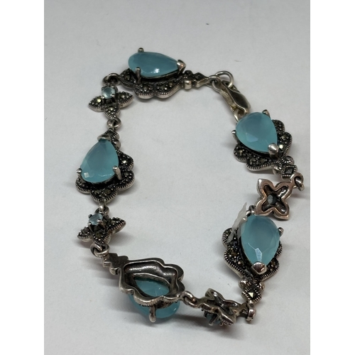 76 - A SILVER MARCASITE AND TURQUOISE STONE NECKLACE WITH MATCHING BRACELET