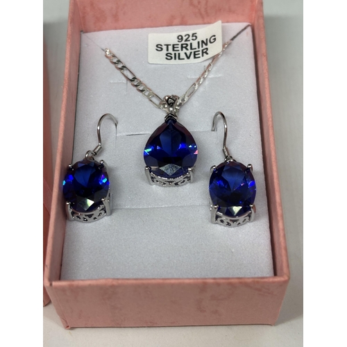 96 - A MARKED SILVER AND BLUE STONE NECKLACE AND EARRING SET IN A PRESENTATION BOX