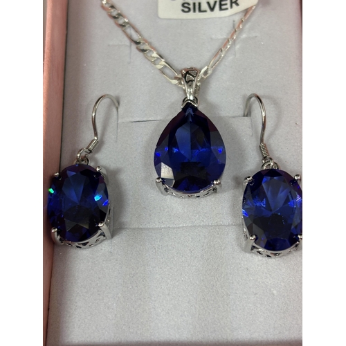 96 - A MARKED SILVER AND BLUE STONE NECKLACE AND EARRING SET IN A PRESENTATION BOX