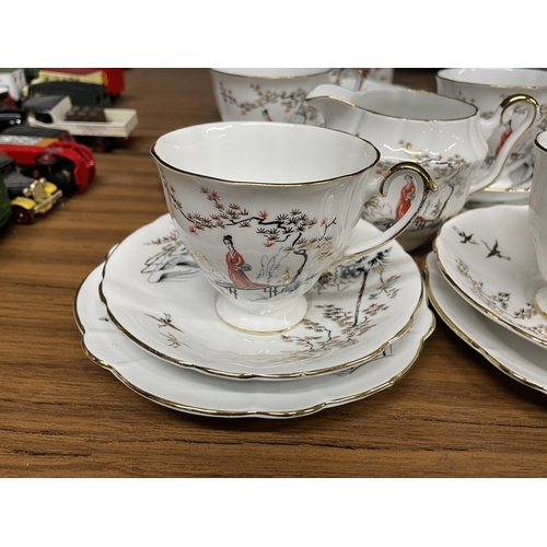 1204 - A VINTAGE WINDSOR 'EASTERN MELODY' TEASET TO INCLUDE A CAKE PLATE, CREAM JUG, SUGAR BOWL, CUPS, SAUC... 