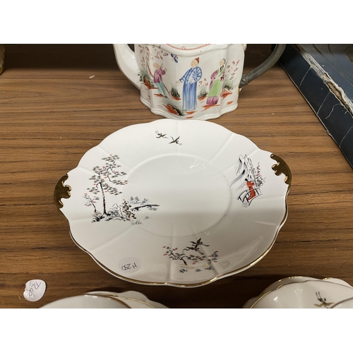 1204 - A VINTAGE WINDSOR 'EASTERN MELODY' TEASET TO INCLUDE A CAKE PLATE, CREAM JUG, SUGAR BOWL, CUPS, SAUC... 