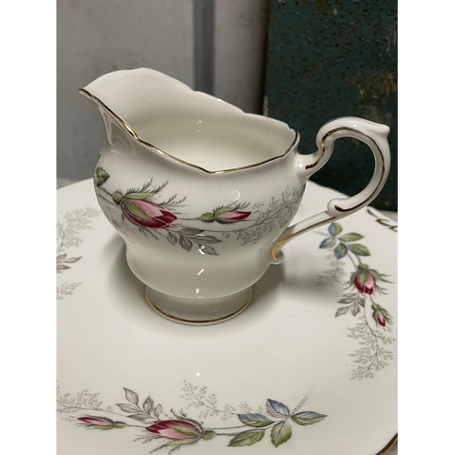 1232 - A PARAGON BRIDAL ROSE TEASET TO INCLUDE CAKE PLATES, TRIO'S, CREAMER, SUGAR BOWL, ETC.,