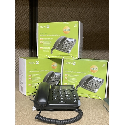 1236 - THREE DORO MAGNA 4000 EXTREMELY LOUD CORDED PHONES AS NEW WITH BOXES