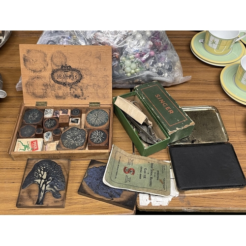 1257 - A COLLECTION OF PRINTING BLOCKS AND A SINGER SEWING MACHINE ATTACHMENT, ETC.,