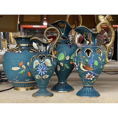 1220 - THREE H BEQUET HAND PAINTED CERAMIC JUGS PLUS A LARGE BULBOUS VASE