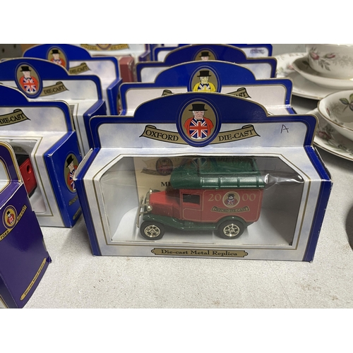 1233 - TWENTY OXFORD DIE-CAST ADVERTISING VANS - ALL AS NEW AND BOXED