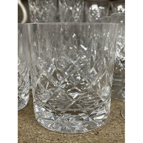 1238 - A QUANTITY OF CUT GLASS ITEMS TO INCLUDE A DECANTER, LARGE JUG, CHAMPAGNE FLUTES, TUMBLERS, SHERRY G... 