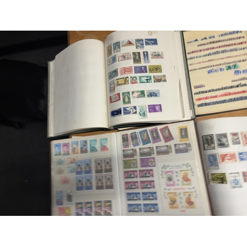 483A - FOUR STOCK ALBUMS CONTAINING GB AND WORLD STAMPS