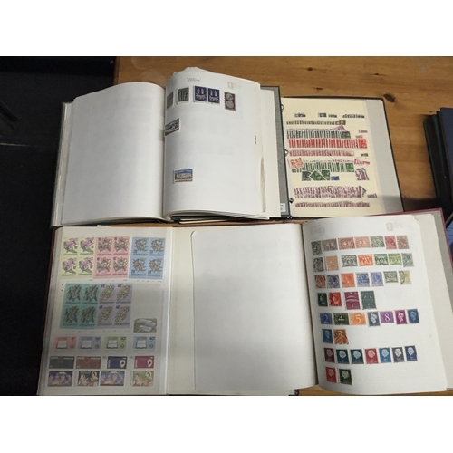 483A - FOUR STOCK ALBUMS CONTAINING GB AND WORLD STAMPS