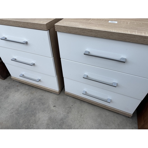 2927 - A PAIR OF THREE DRAWER BEDSIDE CHESTS