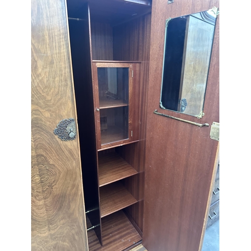 2934 - A MID 20TH CENTURY WALNUT 'HEATHLAND FURNITURE' TWO DOOR WARDROBE ON CABRIOLE LEGS, 38