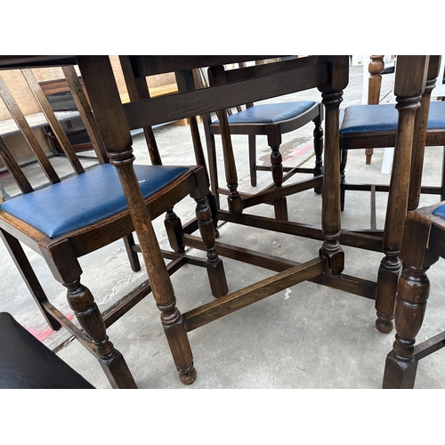 2939 - AN EARLY 20TH CENTURY OVAL GATE LEG TABLE ON TURNED LEGS, 58