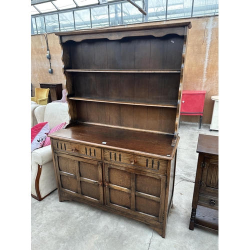 2944 - A REPRODUCTION OAK DRESSER WITH TWO DRAWERS, CUPBOARD AND PLATE RACK, 49