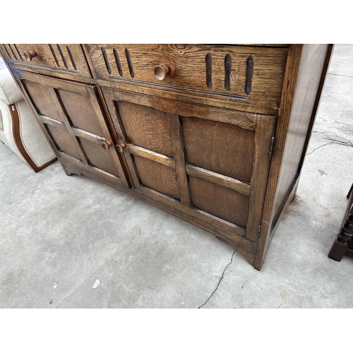 2944 - A REPRODUCTION OAK DRESSER WITH TWO DRAWERS, CUPBOARD AND PLATE RACK, 49