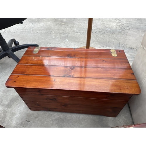 2946 - A PAIR OF PINE STORAGE CHESTS WITH BRASS HINGES, EACH 29.5