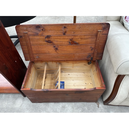 2946 - A PAIR OF PINE STORAGE CHESTS WITH BRASS HINGES, EACH 29.5