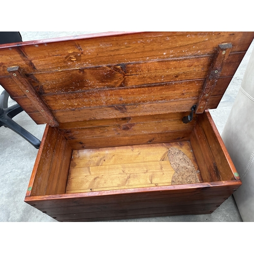 2946 - A PAIR OF PINE STORAGE CHESTS WITH BRASS HINGES, EACH 29.5