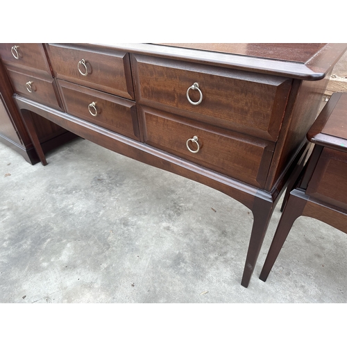 2951 - A STAG MINSTREL DRESSING TABLE ENCLOSING SIX DRAWERS, 52