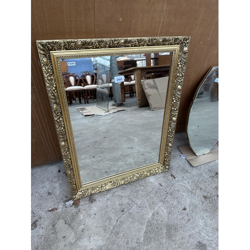 2982 - A GILT FRAMED WALL MIRROR, 28