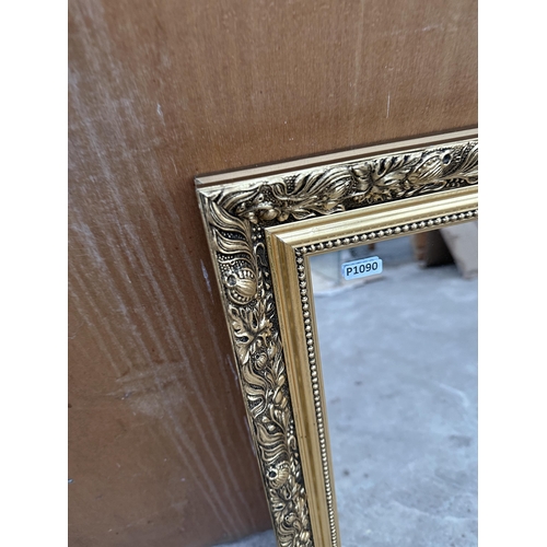 2982 - A GILT FRAMED WALL MIRROR, 28