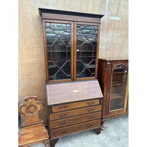 2986 - AN EDWARDIAN MAHOGANY AND INLAID ABSTRACT GLAZED TWO DOOR BUREAU BOOKCASE 38