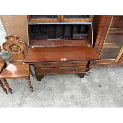 2986 - AN EDWARDIAN MAHOGANY AND INLAID ABSTRACT GLAZED TWO DOOR BUREAU BOOKCASE 38