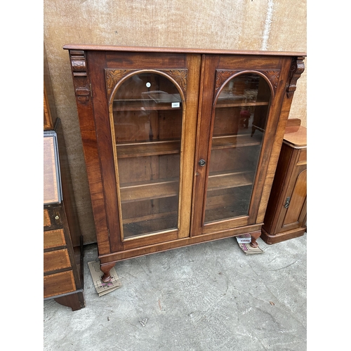 2987 - A VICTORIAN MAHOGNAY ARCHED TWO DOOR GLAZED BOOKCASE ON CABRIOLE LEGS  46