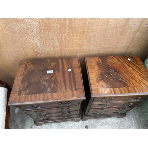 2993 - A PAIR OF SMALL MAHOGANY CROSS BANDED CHESTS OF FOUR DRAWERS 17.5