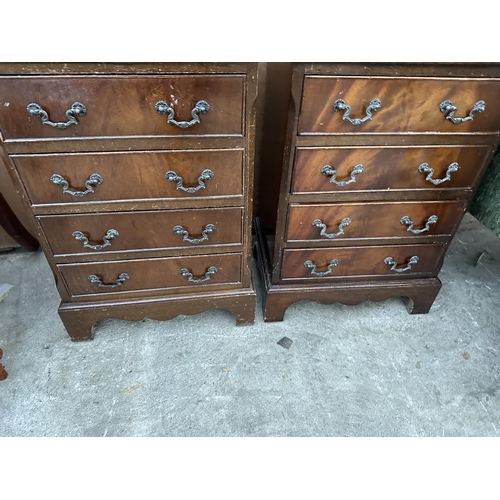 2993 - A PAIR OF SMALL MAHOGANY CROSS BANDED CHESTS OF FOUR DRAWERS 17.5