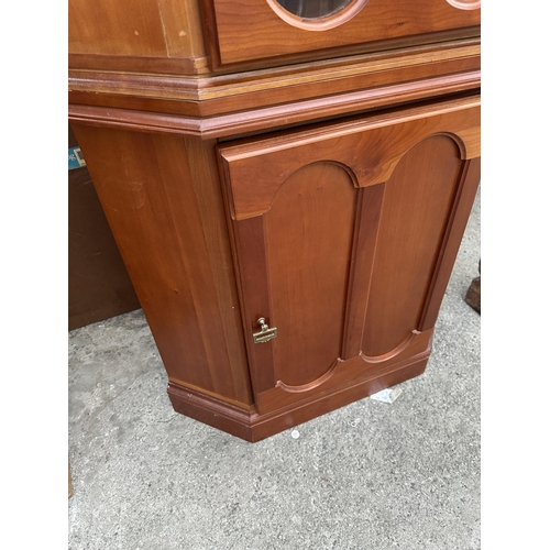 2999 - A RETRO TEAK CANALETTO BY DUCAL CORNER CUPBOARD WITH GLAZED UPPER PORTION 30