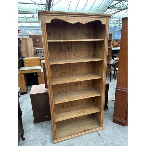 3000 - A PINE SIX TIER OPEN BOOKCASE 36