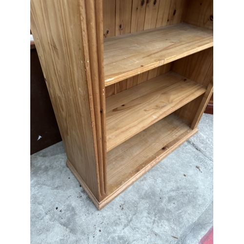 3000 - A PINE SIX TIER OPEN BOOKCASE 36