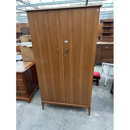 3003 - A RETRO TEAK TWO DOOR WARDROBE BY ALFRED COX 38