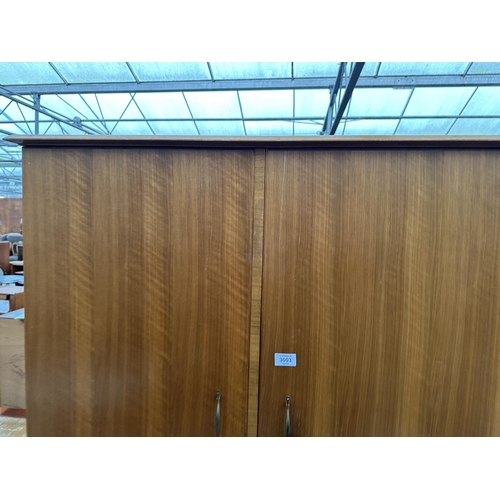 3003 - A RETRO TEAK TWO DOOR WARDROBE BY ALFRED COX 38